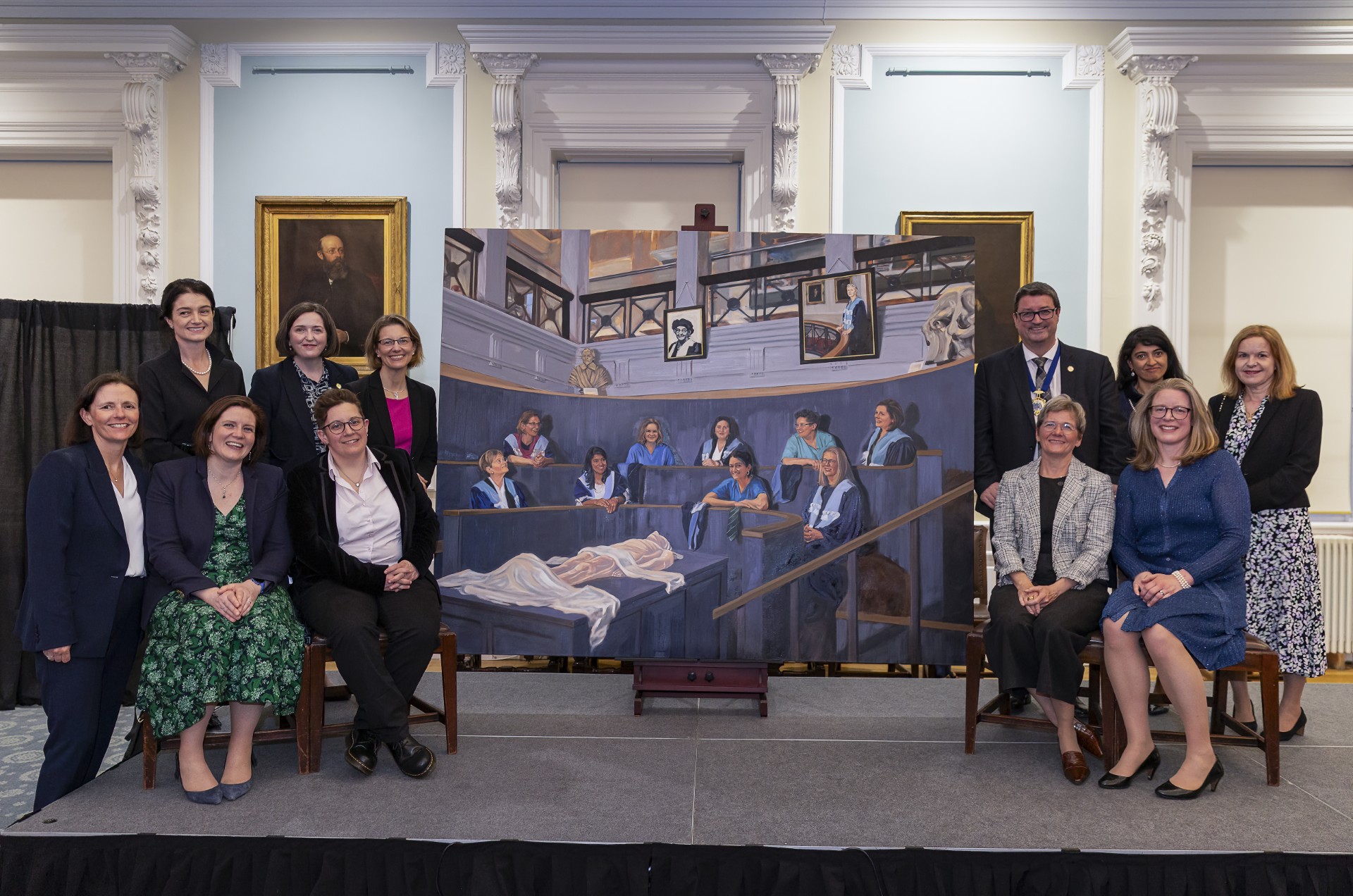 Surgeons with portrait, ©RCSEd Surgeons with portrait