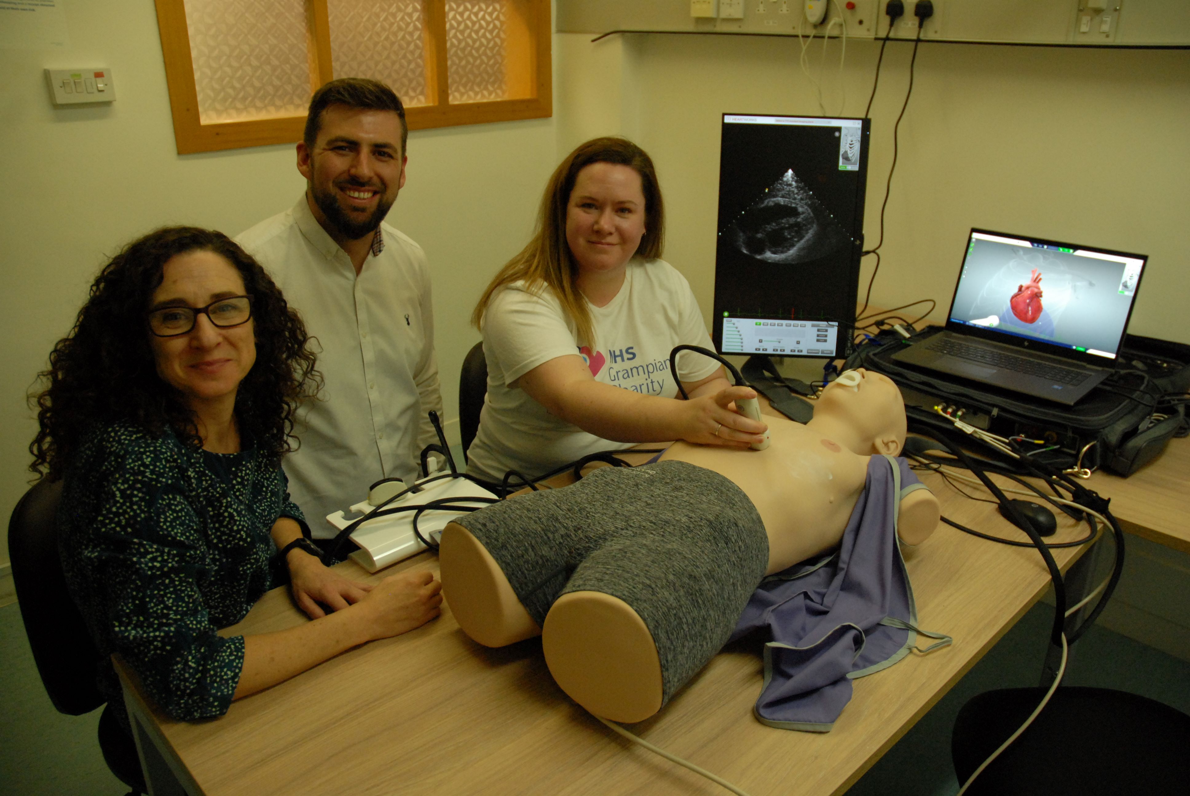 l to r – Vera Lennie, Ben Elliott and Nicky MacBeath try out the new ECHO simulator