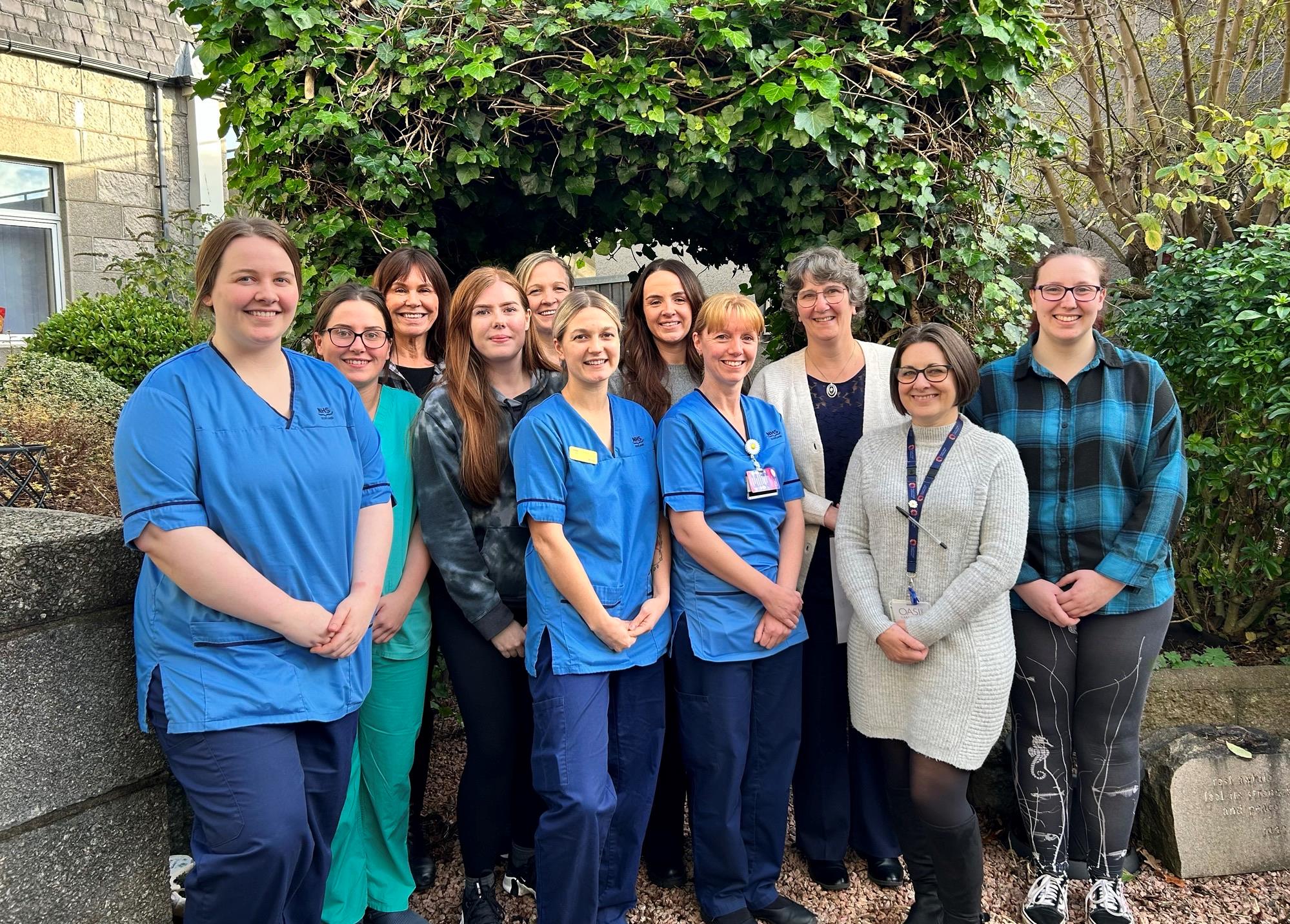 Photos capture members of the team from the Rubislaw Ward in their garden area at Aberdeen Maternity Hospital. While just a handful of team members are on shift at any one time, we were lucky to catch up with them following a training session.