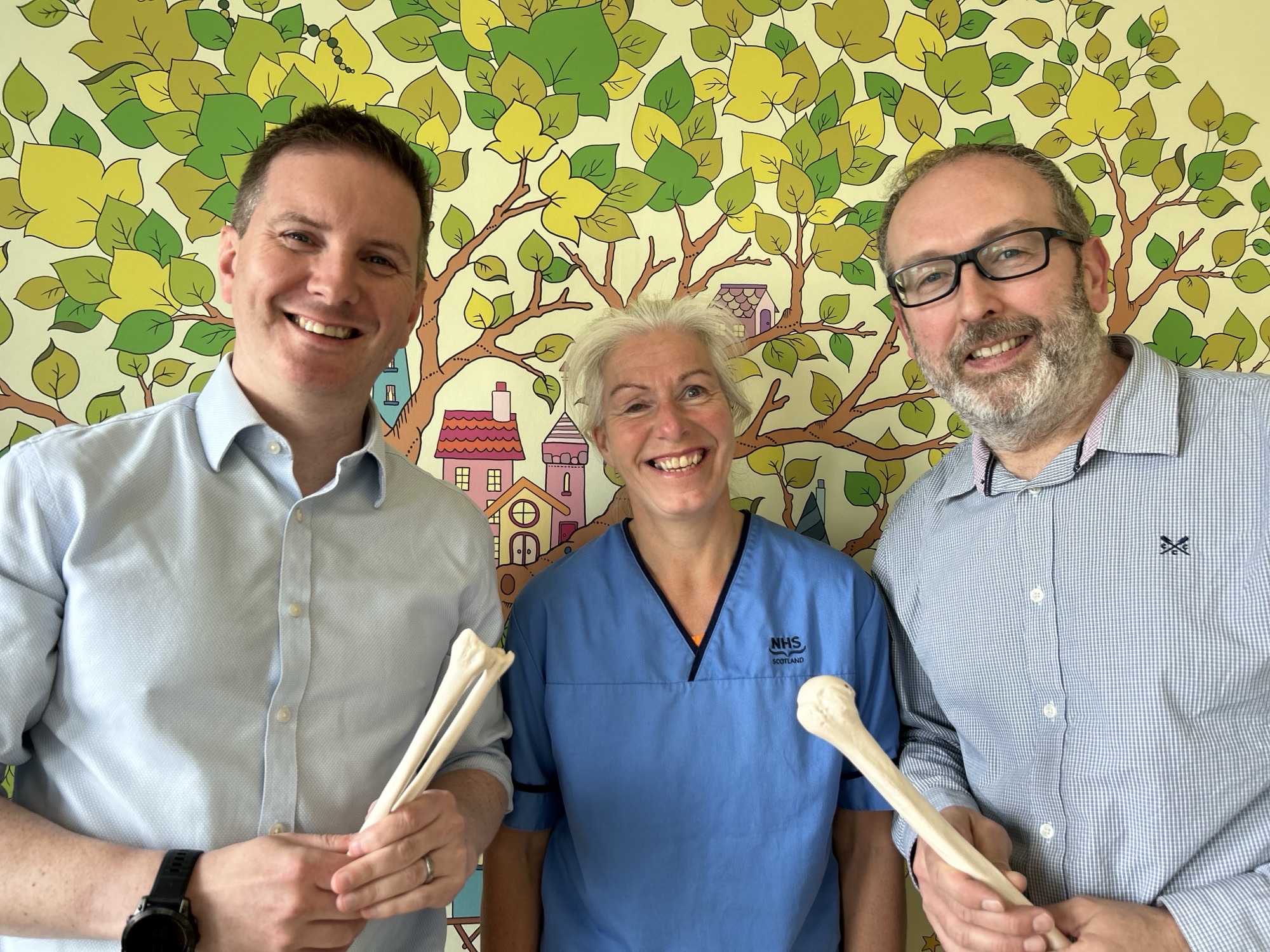 (from left to right) Mike Reidy, Maggie Connon and Simon Barker, both within the Craig Research Unit and outside Royal Aberdeen Children’s Hospital.