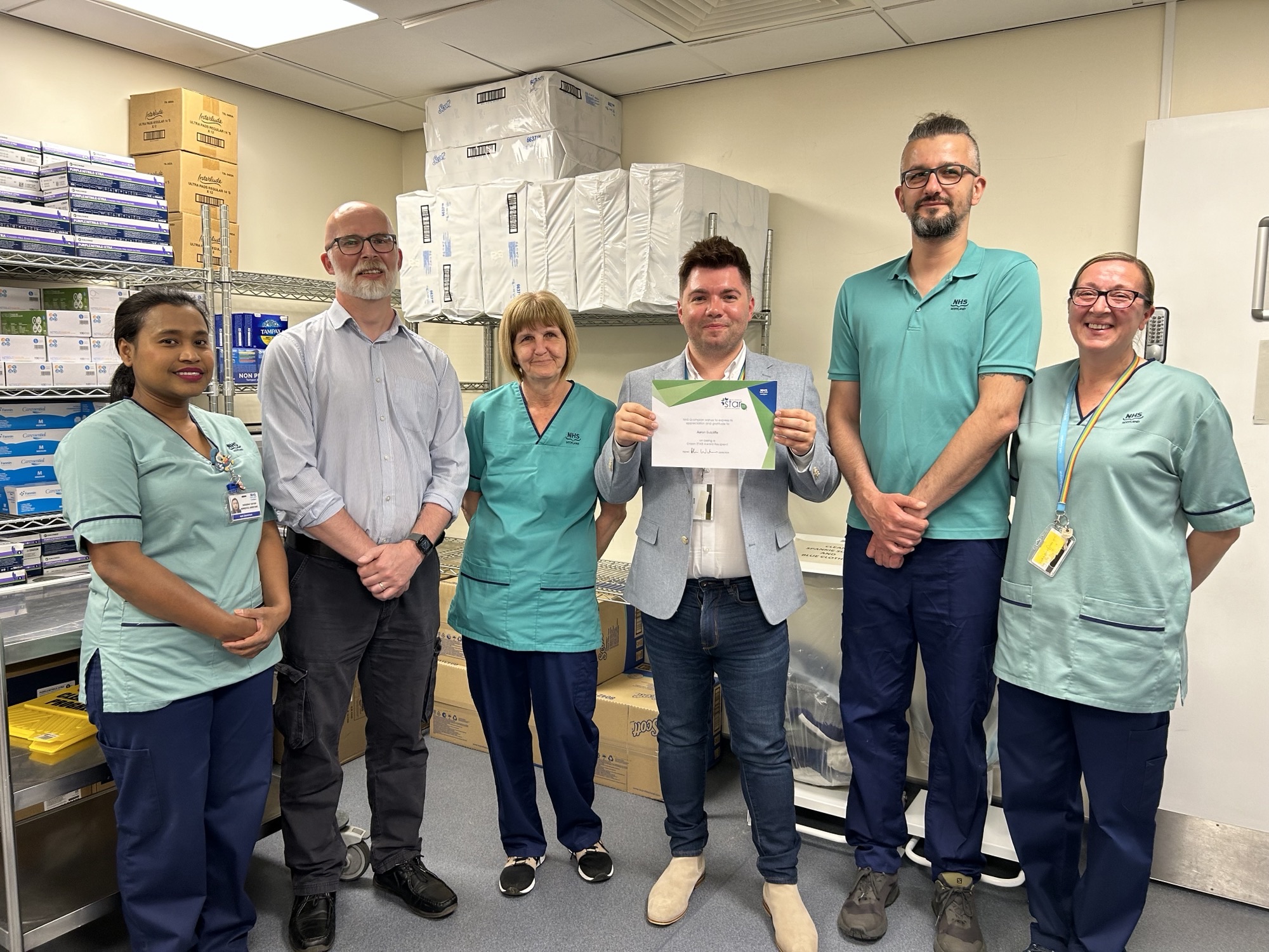 Aaron Sutcliffe and his team alongside Neil Duncan at Aberdeen Royal Infirmary