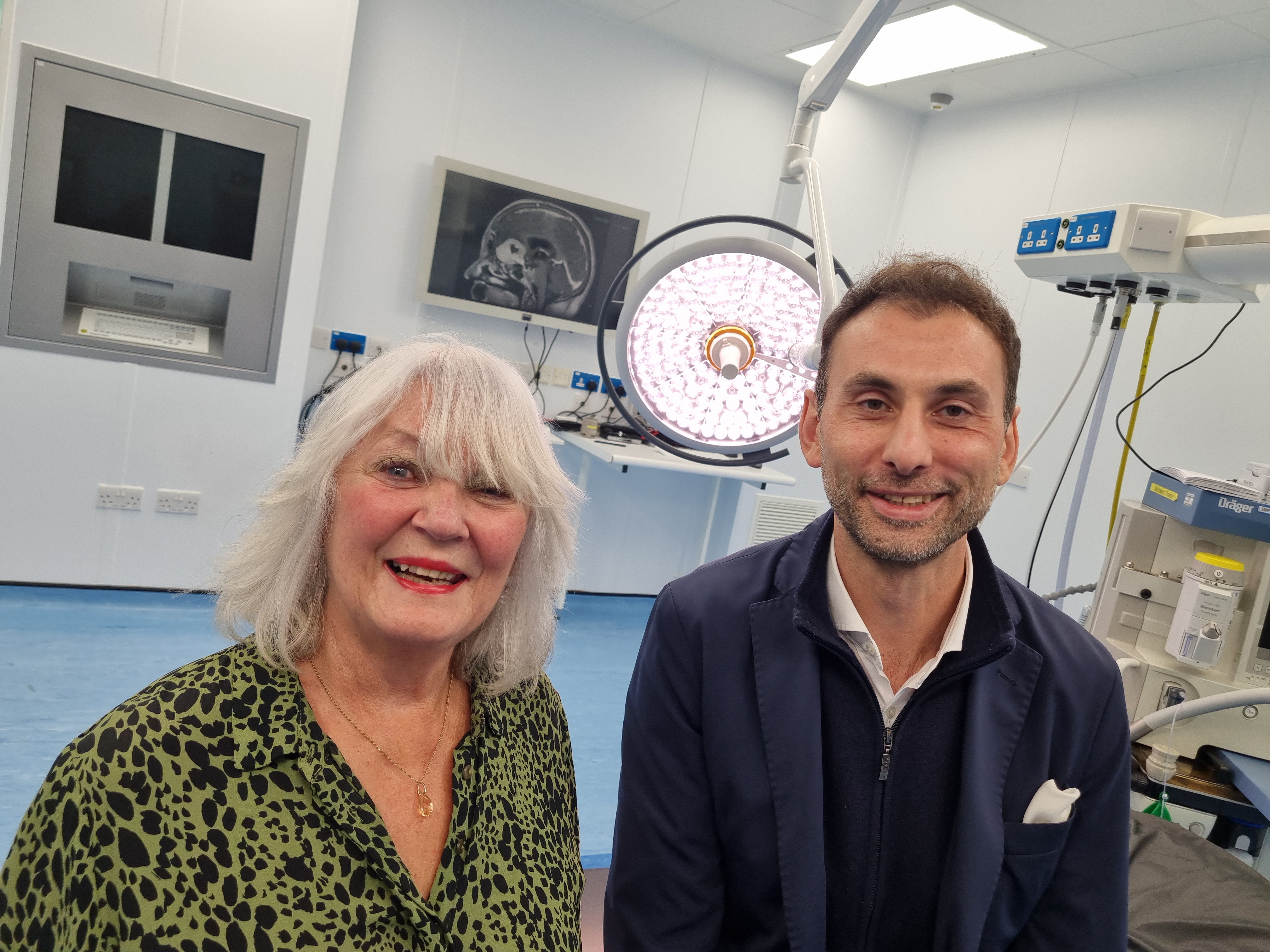 Consultant neurosurgeon, Anastasios Giamouriadis and Patient, Doreen Adams.