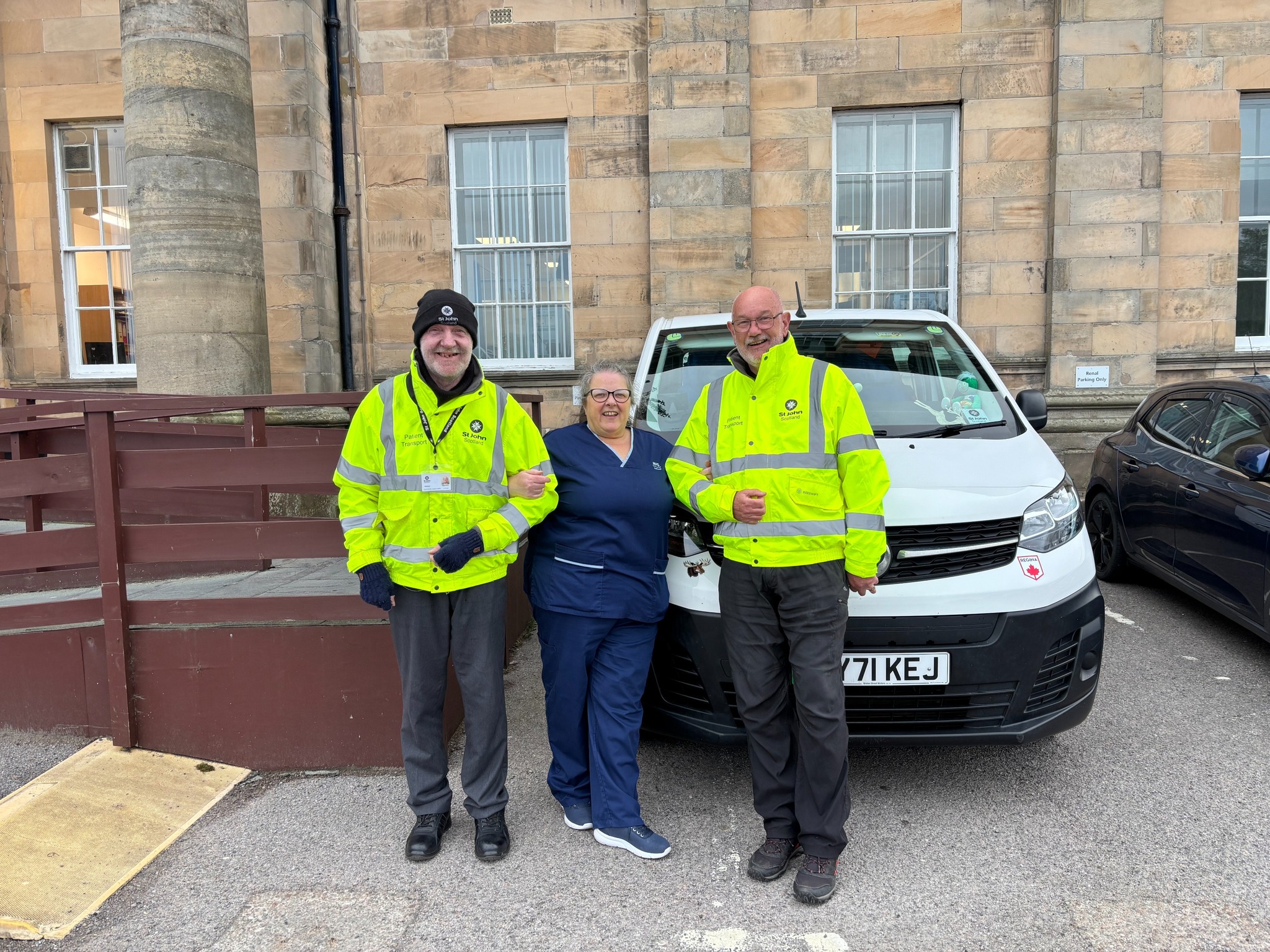 Meet the Banff and Elgin volunteers covering 2,000 miles a month in support of local dialysis patients, ©NHS Grampian Photograph shows (from left to right): Volunteer driver Nigel Dixon, senior charge nurse Linda Willows and volunteer driver Alastair Maltman outside Dr Gray’s Hospital in Elgin.