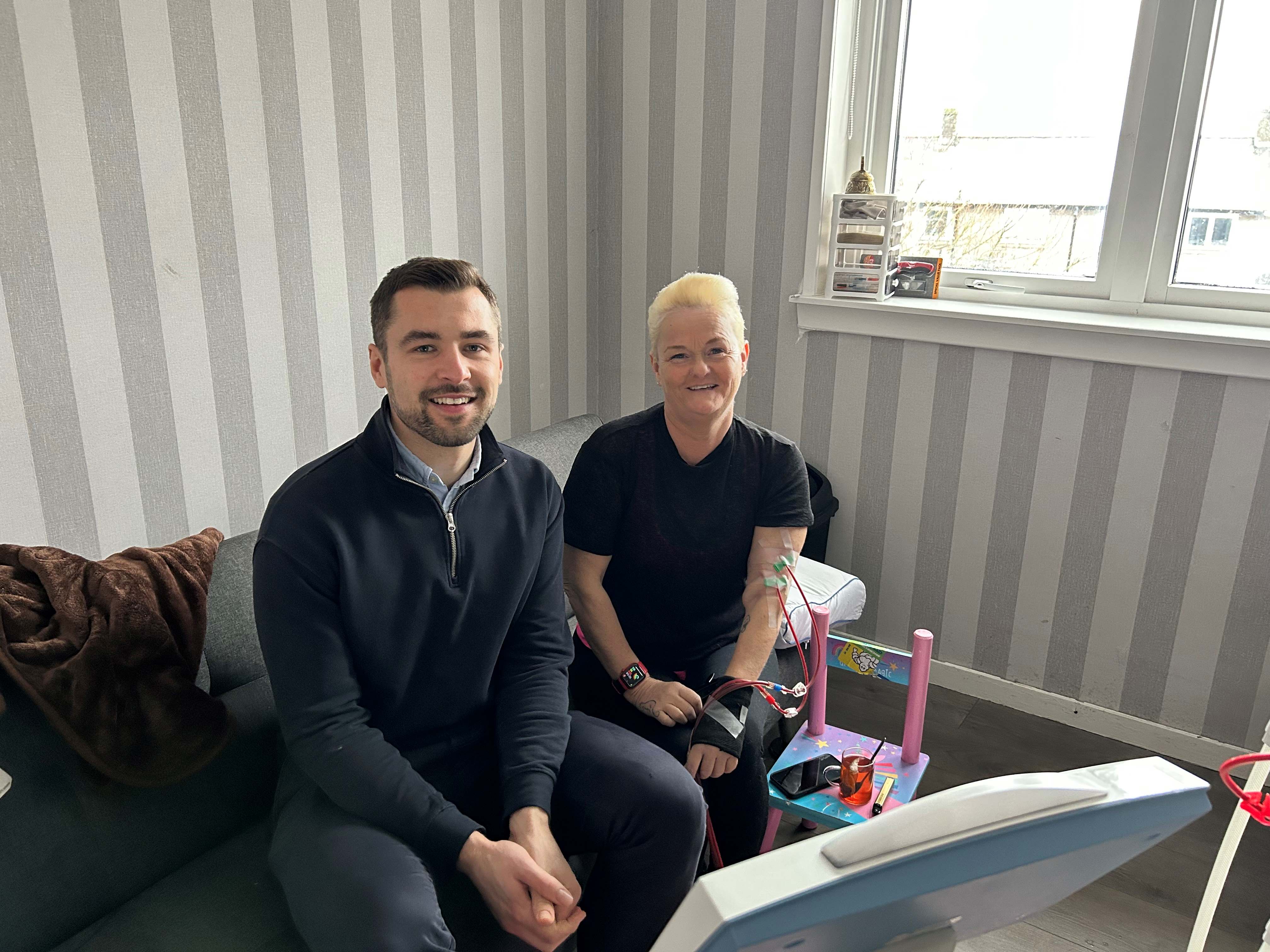 Victoria is pictured alongside Scott in her home in Kincorth.