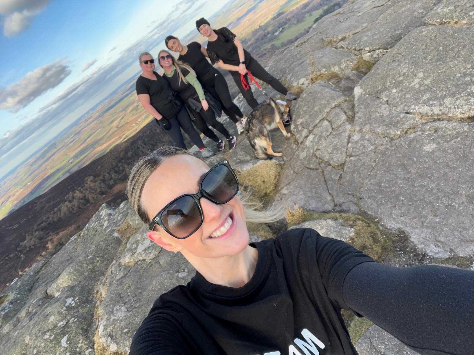 Alana and her midwifery colleagues on the final day of their challenge at the summit of Bennachie.